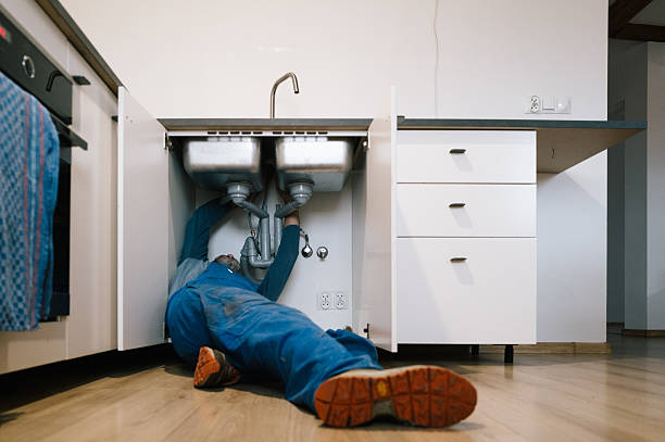 Professional Emergency Plumber technician working in Funston, GA